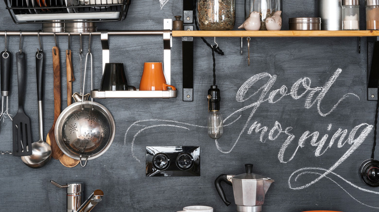 Chalkboard kitchen backsplash with "good morning" written on it