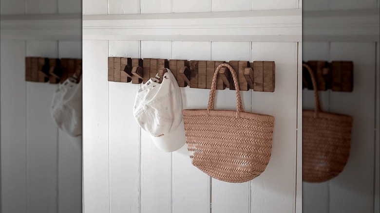 Flip-down coat rack made from scrap wood