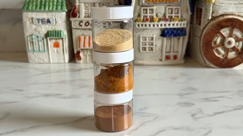 Jars with white lids filled with spices