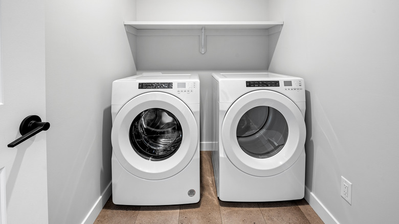 A small white laundry room