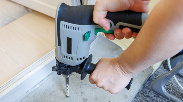 Drilling into concrete with a hammer drill