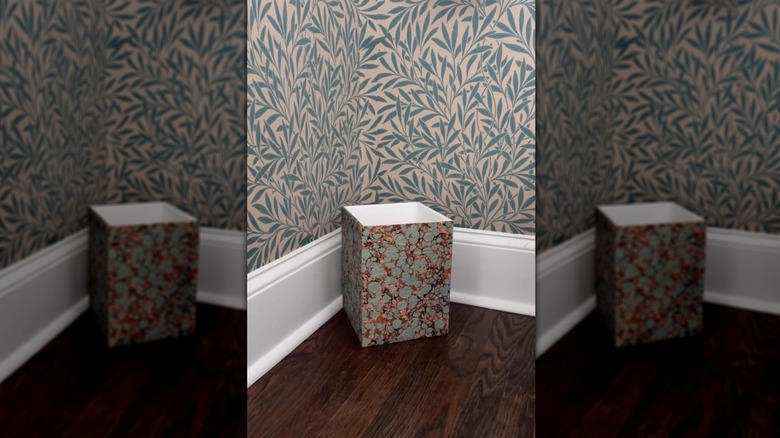Bathroom trash can given makeover with decoupage