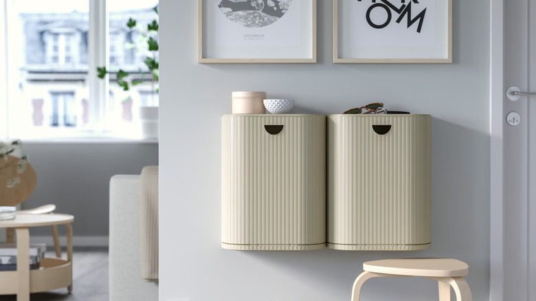 Two GÅRDSBUTIK Bins with Lid mounted on wall