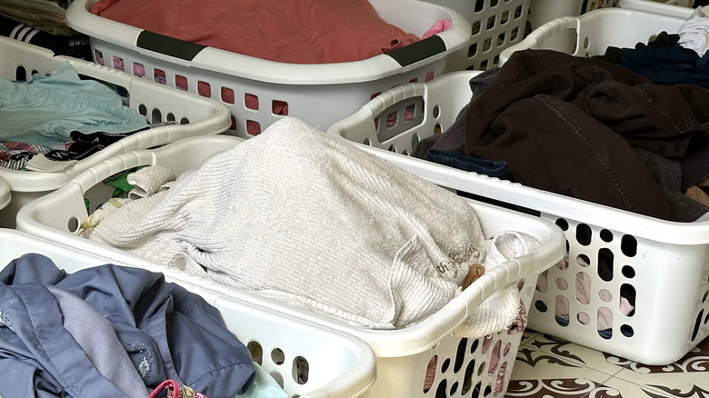 Laundry baskets spread out on the floor