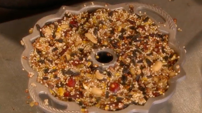 A Bundt pan with bird seed