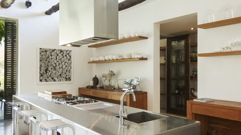 Modern kitchen with a metallic countertop.