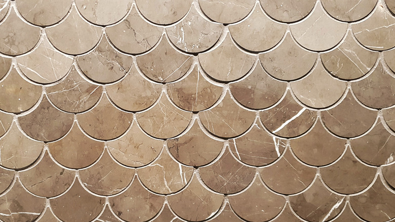 Brown and white fish scale tiles