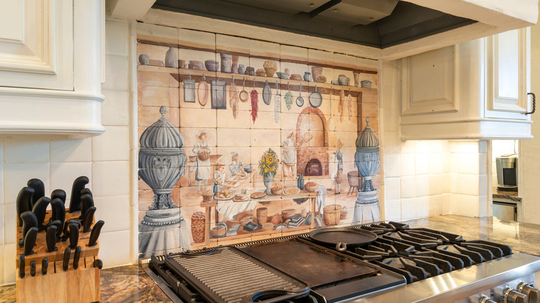 Kitchen backsplash painted with an image of a vintage bakery