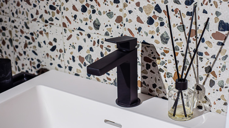 Sink with a terrazzo backsplash