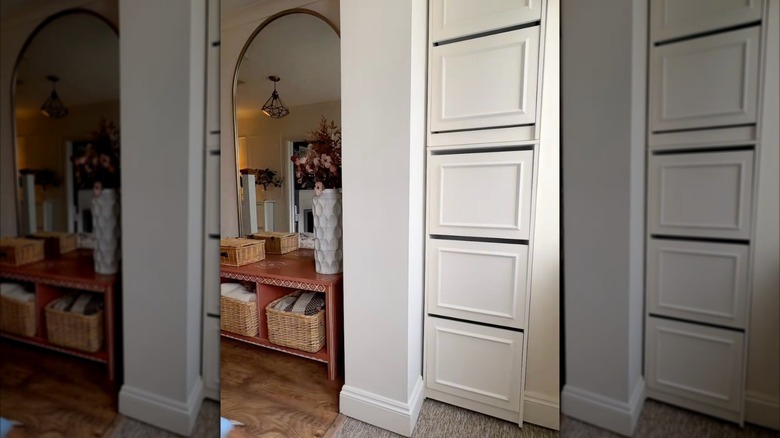 IKEA BISSA shoe cabinets stacked on top of each other to create a customized floor-to-ceiling built-in storage solution