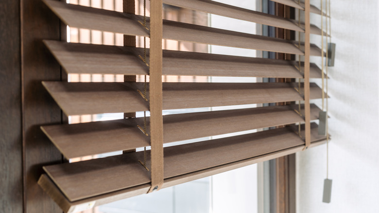 wood style blinds on a window