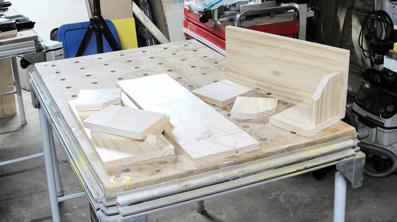 The wood pieces of the bookcase cut and ready to assemble