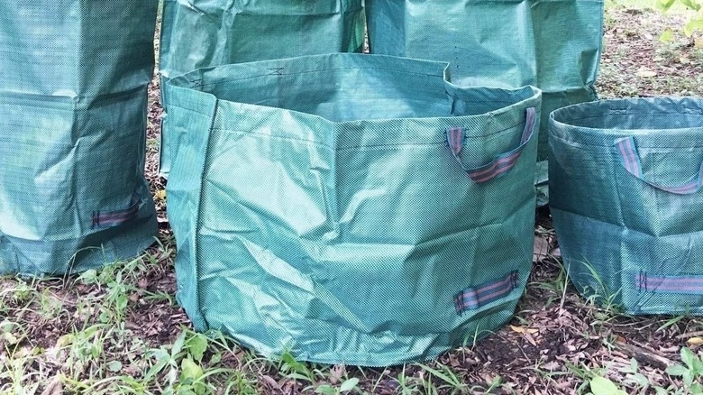 Tespher reusable garden bags in a yard