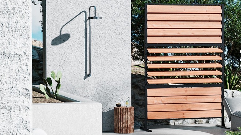 Modern Shade Louvered Wood Privacy Panel next to an outdoor shower