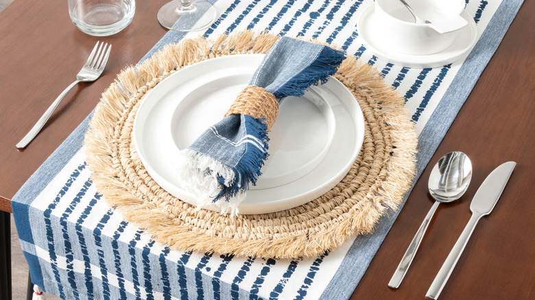 Close up of table setting with runner