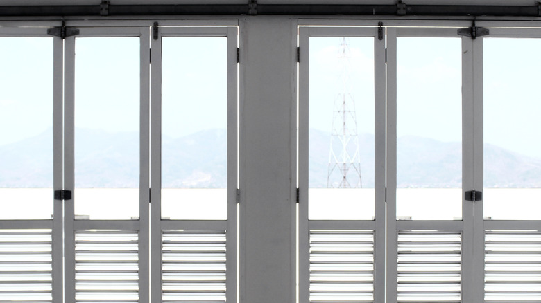 White sliding shutters