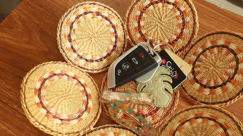 DIY coaster bowl sitting on a table with keys in it