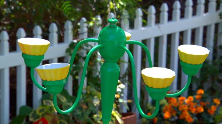 Old chandelier turned into DIY bird feeder