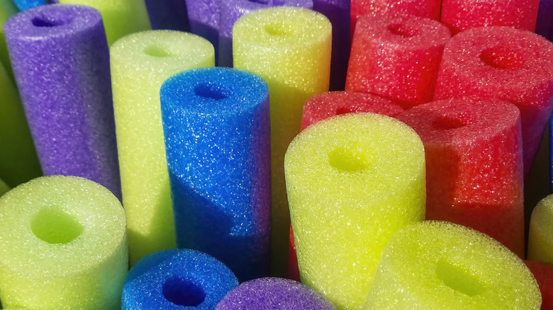 Bright colored pool noodles