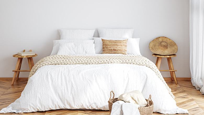 bedroom with plain white painted walls