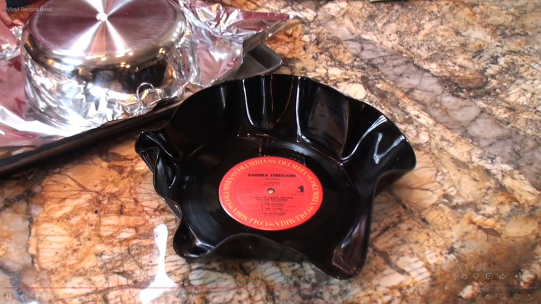 Vinyl record bowl sitting on a stone counter