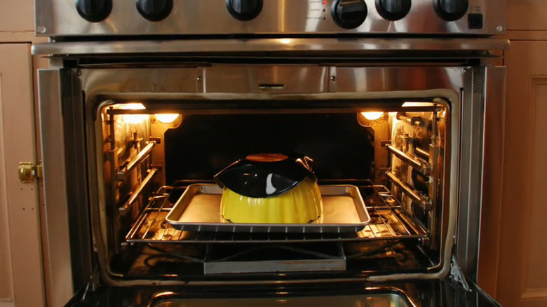 A vinyl record melting in a kitchen oven
