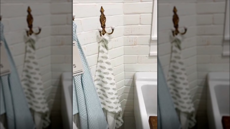 The finished wood brick laundry room wall
