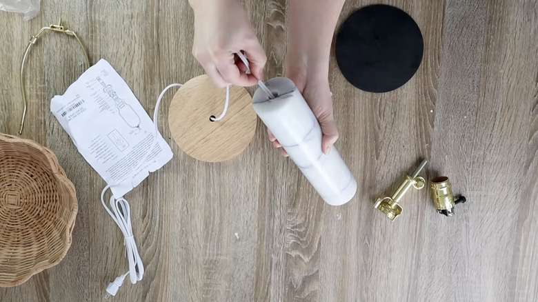 wiring a broken marble rolling pin with a lamp kit to make a table lamp