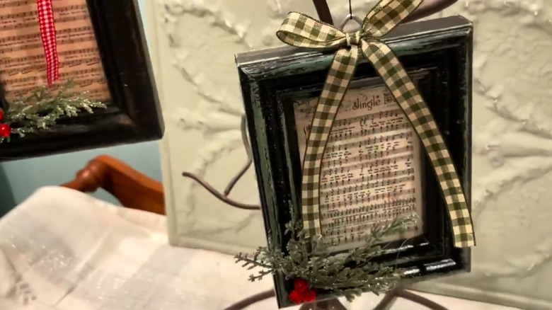 a Christmas ornament made from a picture frame