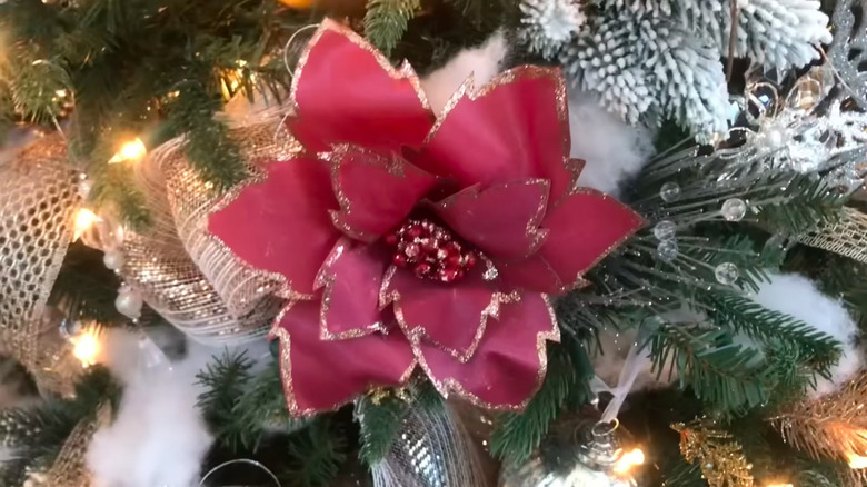 a poinsettia made from repurposed red fabric