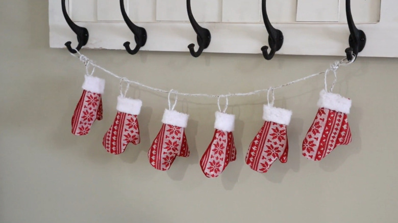 a garland made from small repurposed mittens