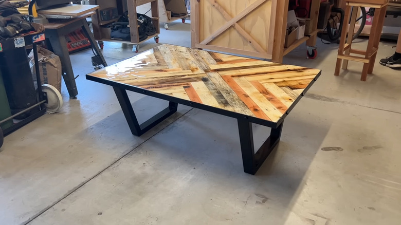 An elaborate table made of pallet wood