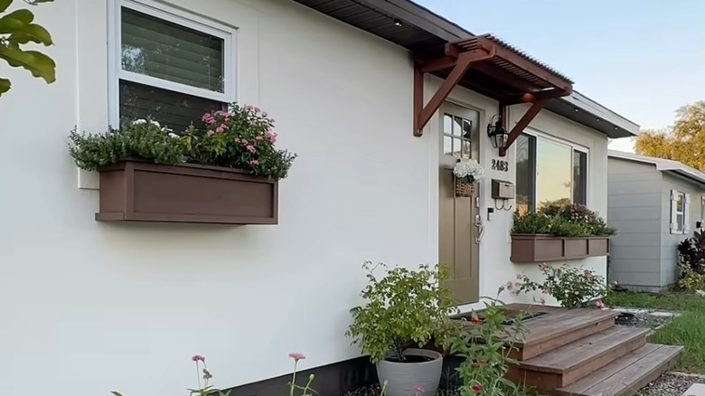 Small awning covering front door of John Dolechek's home