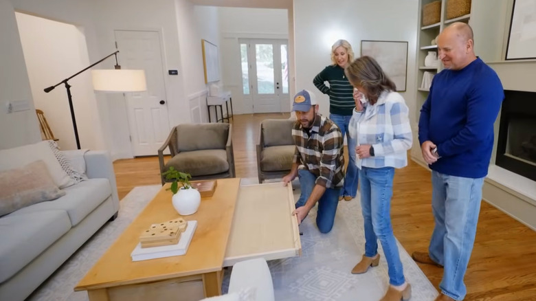 Dave Marrs shows a "Fixer to Fabulous" couple a custom-built gaming table