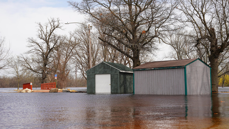 flood rising up around sheds