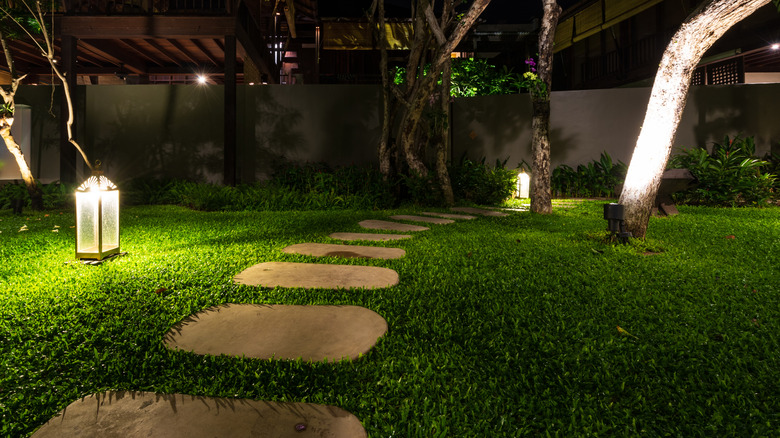 A walkway with lighting at night