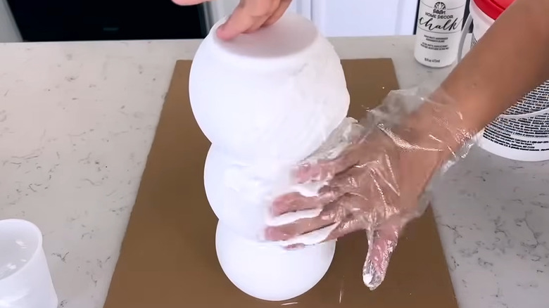 Creator applying texturing to the vase