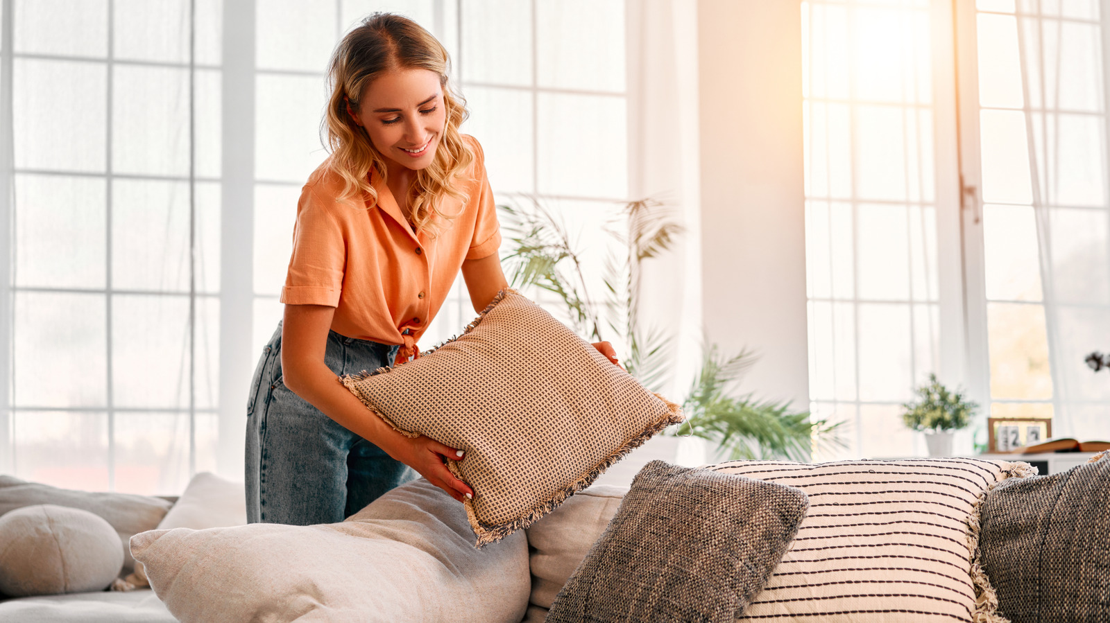 Forget Bins: A More Stylish Way To Organize Throw Pillows With A Dollar Tree DIY