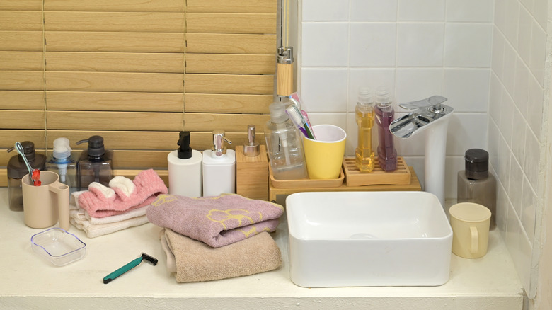 items all over a bathroom counter