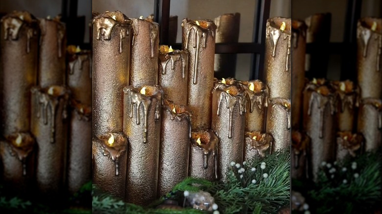 Candle holders made out of pool noodles to look like larger candles