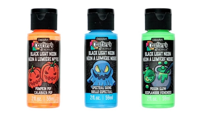 Three bottles of Crafter's Black Light paints