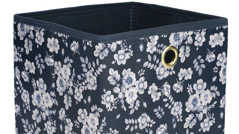 Fabric storage box from Dollar Tree with a blue and white floral pattern