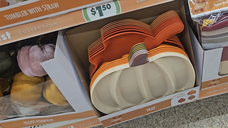 Harvest-shaped serving trays on the shelf at Dollar Tree