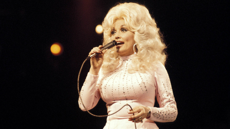 Dolly Parton singing on stage