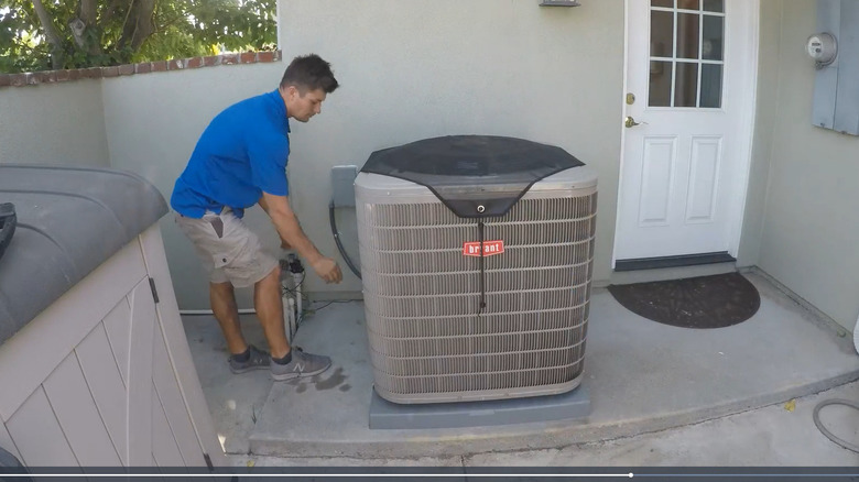 installing a central air conditioner cover for outside units
