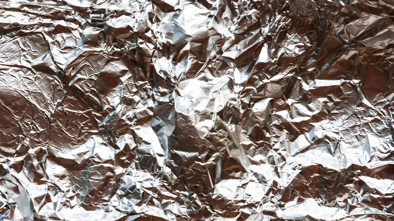 A close up shot of wrinkled foil.