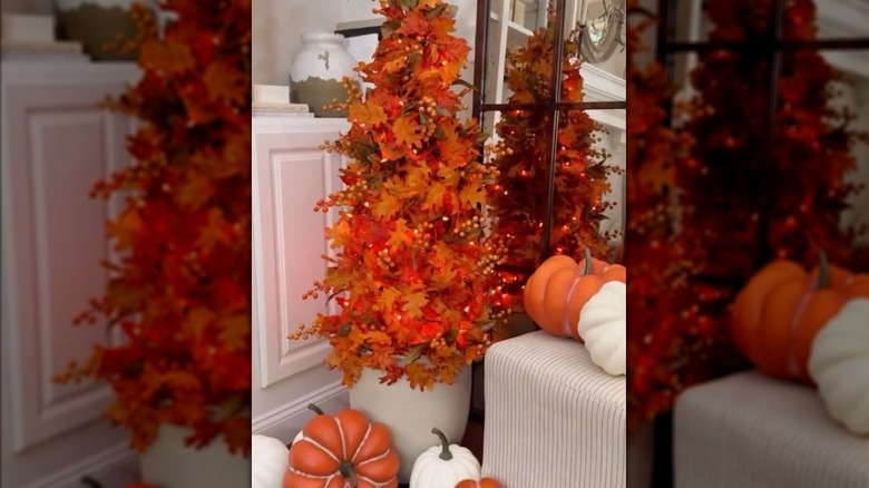 Fall topiary made from a tomato cage and garland