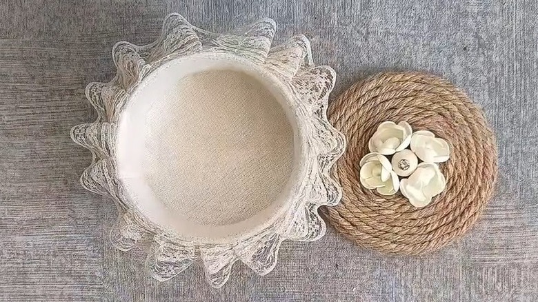 Empty can upcycled into cute countertop storage container