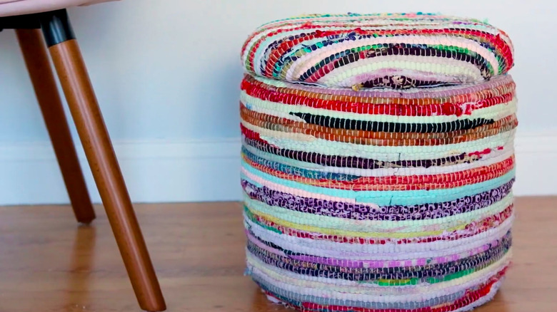 a plastic bucket upcycled into a boho ottoman