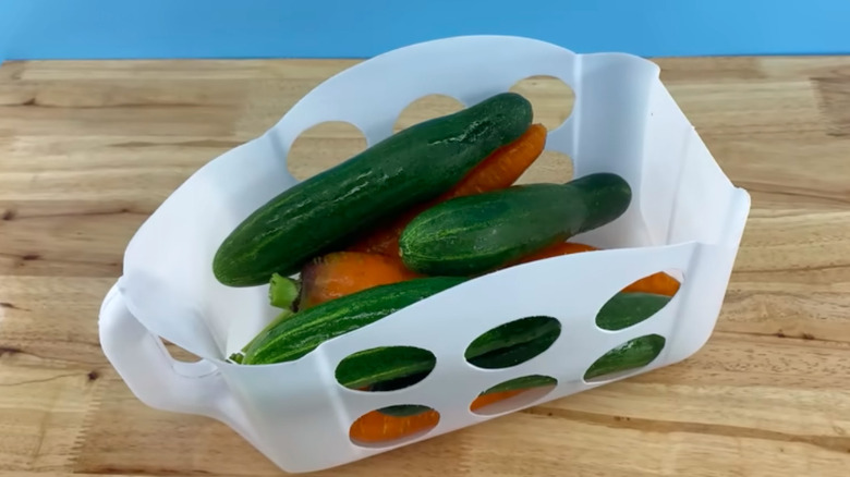 a produce drawer crafted from an old plastic jug